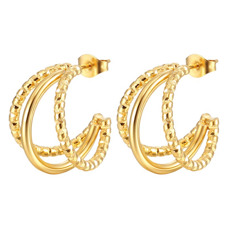 Moda europea y americana transfronteriza 18K chapado en oro de múltiples capas patrón línea de acero inoxidable pendientes de moda retro de las mujeres del todo-fósforo pendientes