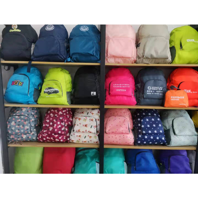 Mochila al aire libre regalo publicidad de gran capacidad ligera hombres y mujeres mochila plegable de impresión