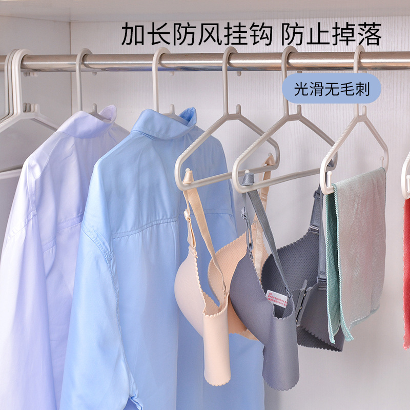 Percha de ropa antideslizante engrosada multifuncional hogar de plástico sin costuras estante de ropa de hombro ancho con soporte de ropa de gancho engrosado ensanchado
