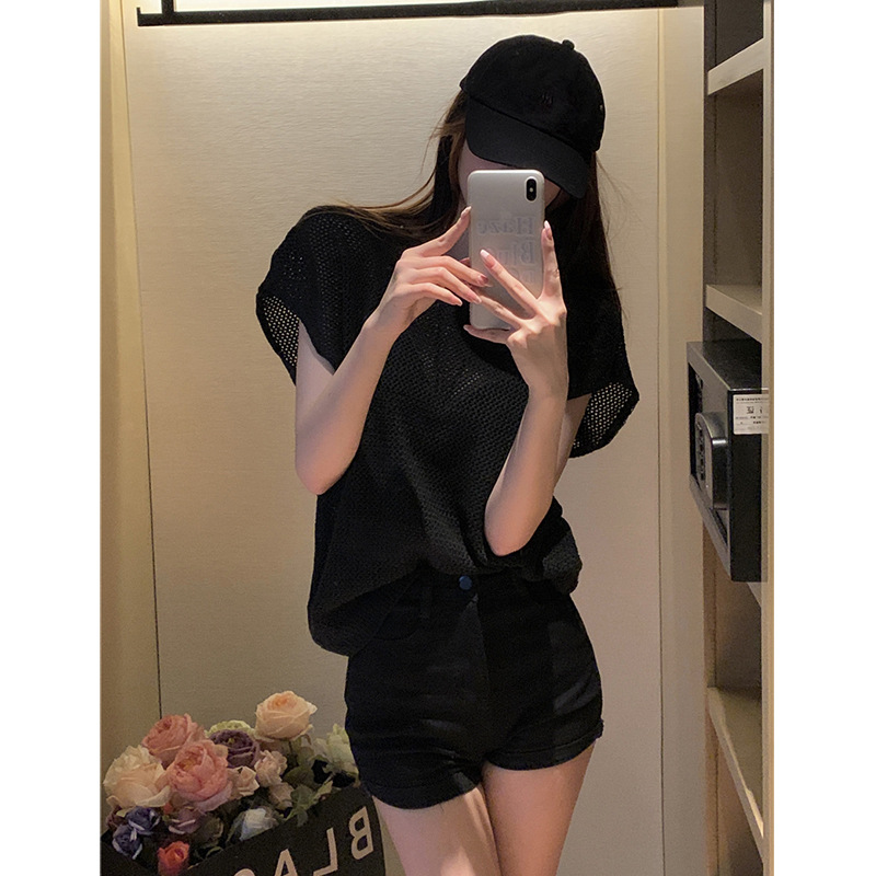 Camiseta de manga corta de estilo coreano para mujer verano delgada chica caliente diseño de blusa de protección solar hueca suelta adelgazante Top corto