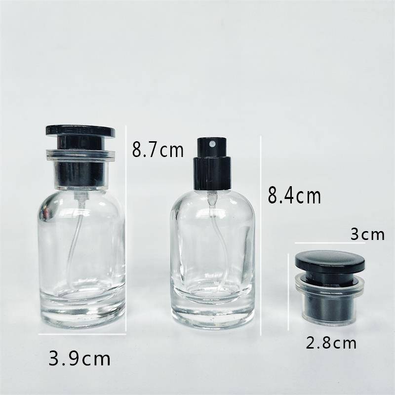 Spot B100-30ml 50ml 100ml botella redonda simple cubierta negra de vidrio frasco de spray portátil de perfume