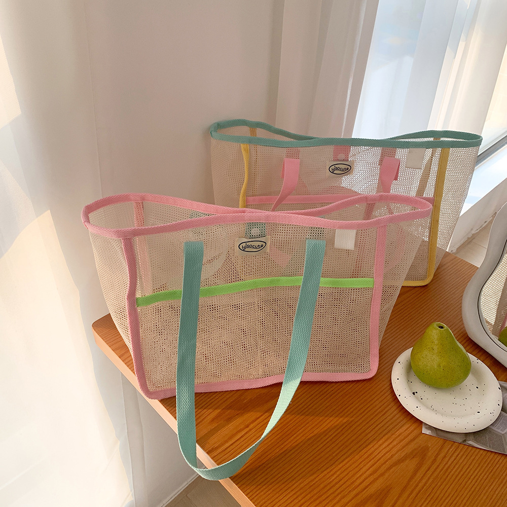 Ins-style color-blocking mesh handbag, macaron color-blocking grid storage bag, portable cosmetic tote bag for outings