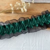 1 meter long, about 4 centimeters wide, dark green