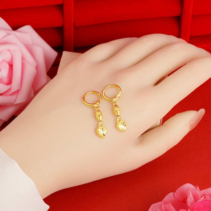 Arena oro amor pendientes de las mujeres de aleación de cobre melocotón corazón pendientes estrella de alto grado en línea popular en vivo suministro al por mayor