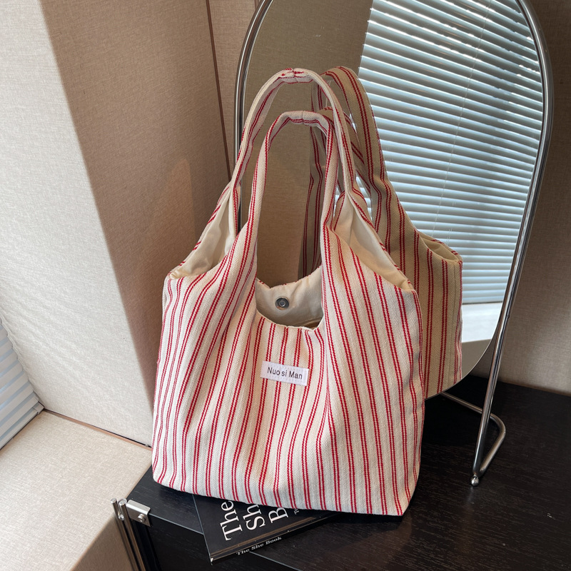 Bolso Tote de moda coreana 2025 nuevo bolso de lona estilo azul marino a rayas bolso de hombro con letras casuales