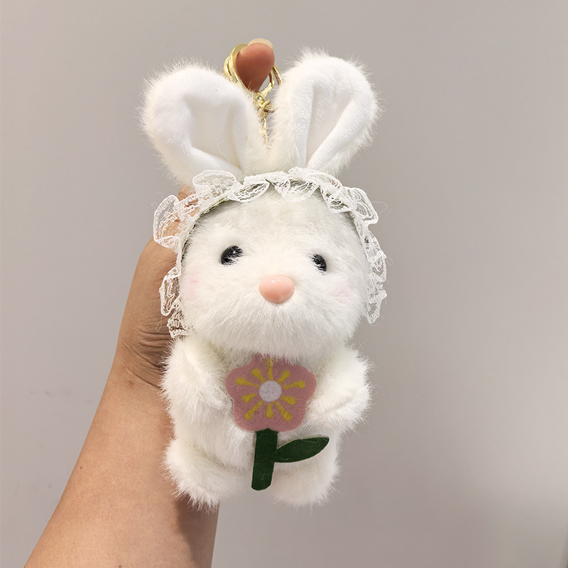 かわいい新型の毛のふわふわしたウサギのぬいぐるみのキーホルダーはかわいいウサギの人形のかばんを掛けて飾ります。|undefined