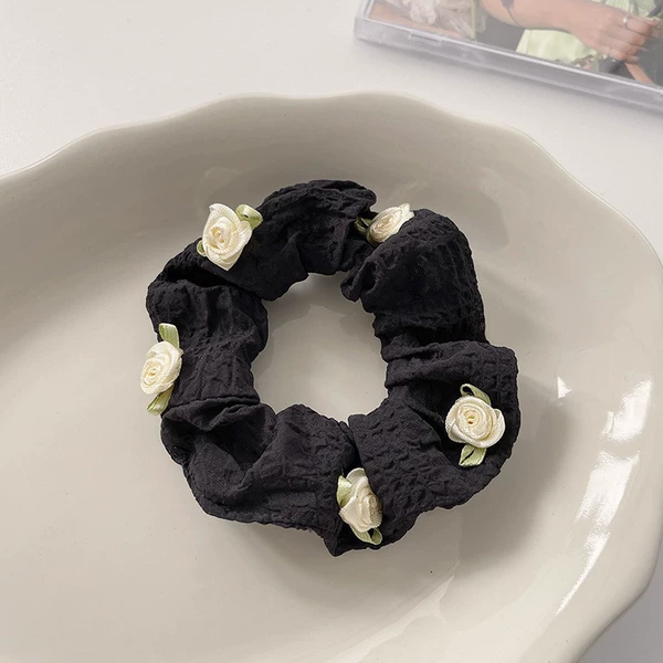 Five white roses