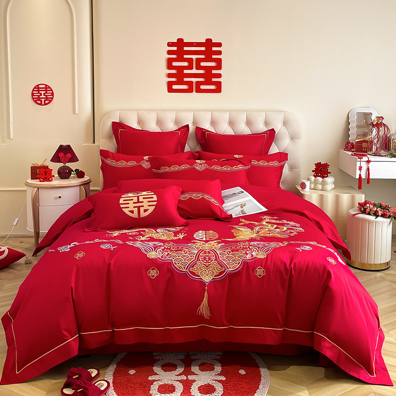 Una clase de madres y bebés de algodón de boda cuatro piezas grandes sábanas bordadas rojas chinas cubierta de cama de boda