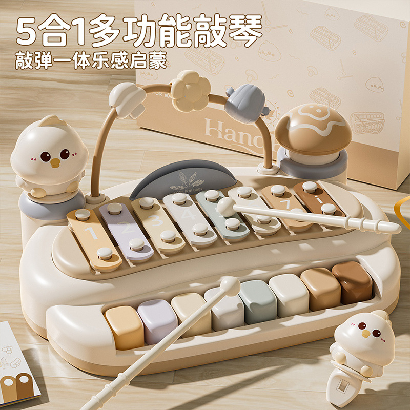 This 5-in-1 eight-tone percussion instrument is a fun and educational toy for toddlers aged 6-12 months, designed for early music development.