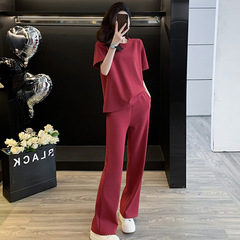 ヨーロッパの商品の純色の運動のレジャーのスーツの女性の夏はやせて年齢を減らします。