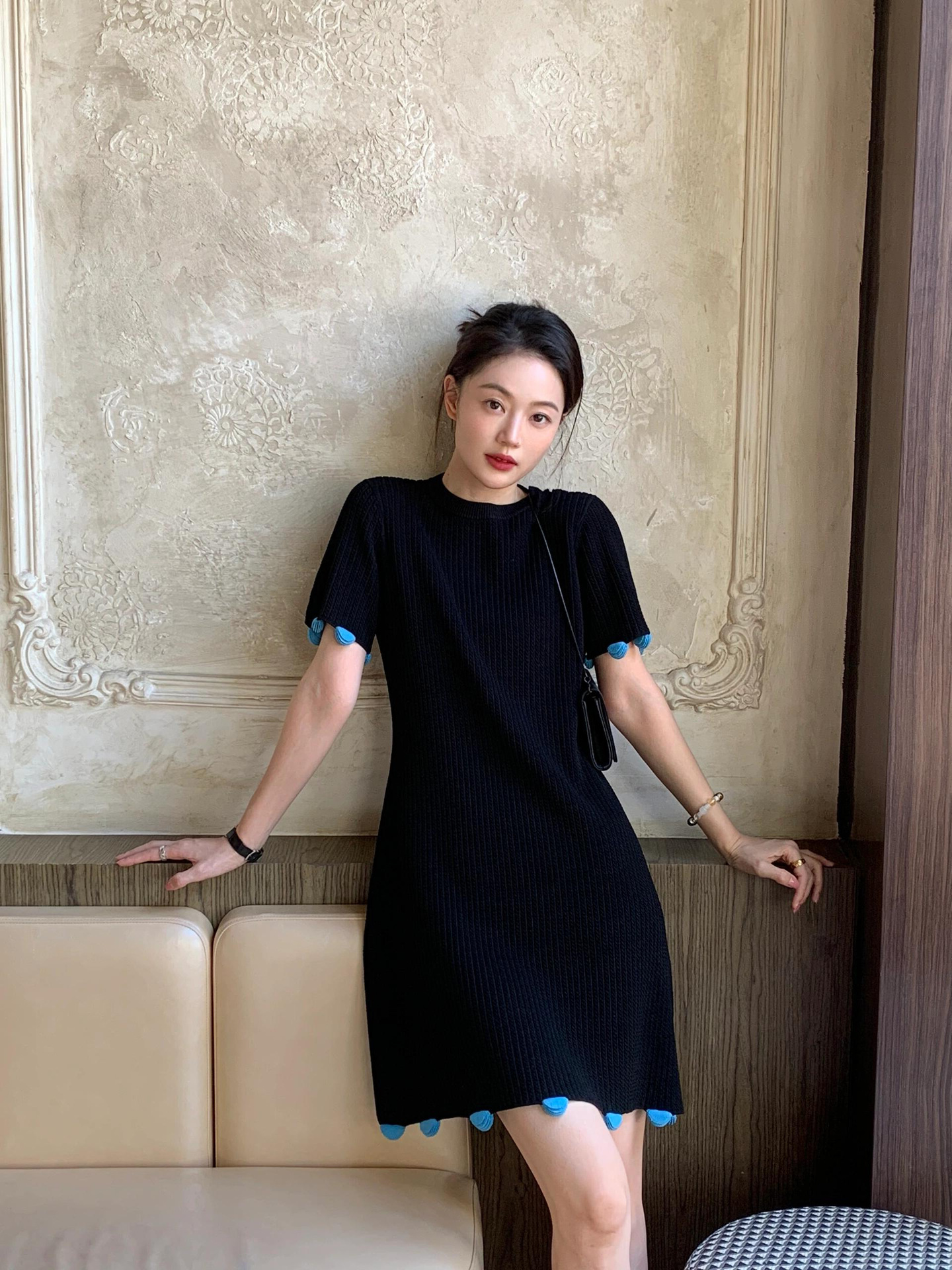 Black summer knitted dress with a round collar