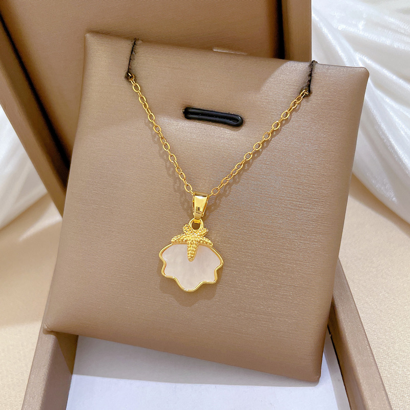Colar de concha estrela do mar em aço titânio para mulher_voghion.com
