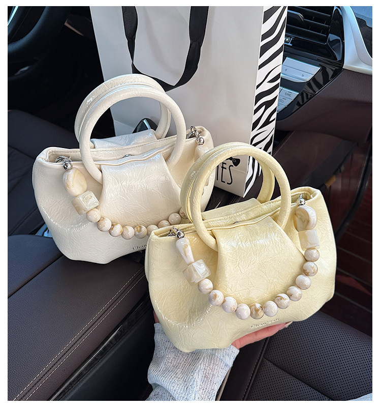 A stylish and trendy beaded bag for women, a new summer chain crossbody cloud bag for women in 2025 full figure