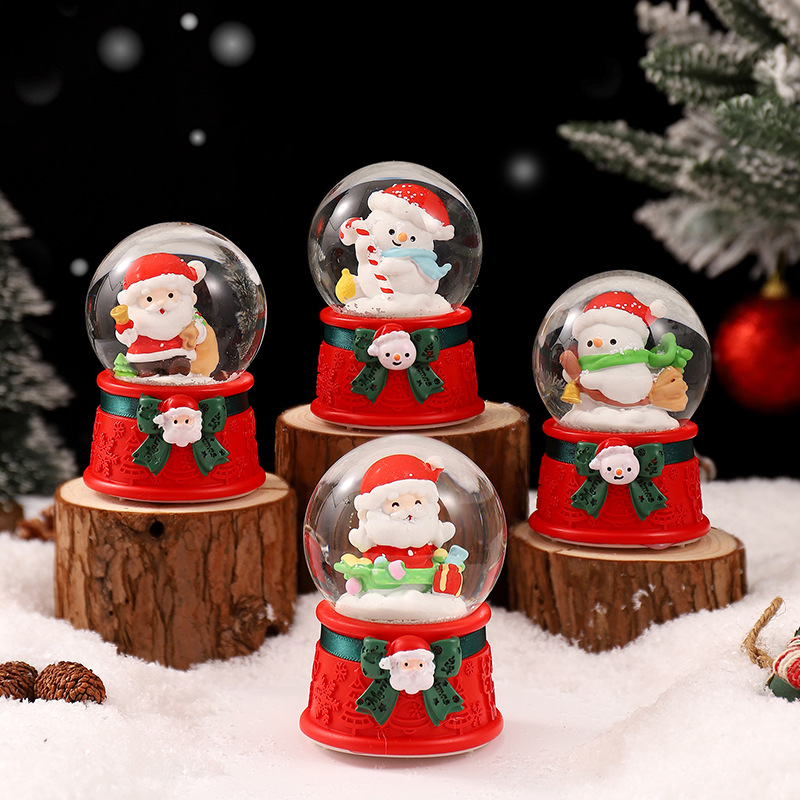 Una variedad de regalos de decoración de Navidad Navidad iluminante bola de cristal caja de música ventana diseño de velas lámparas de viento árbol de Navidad