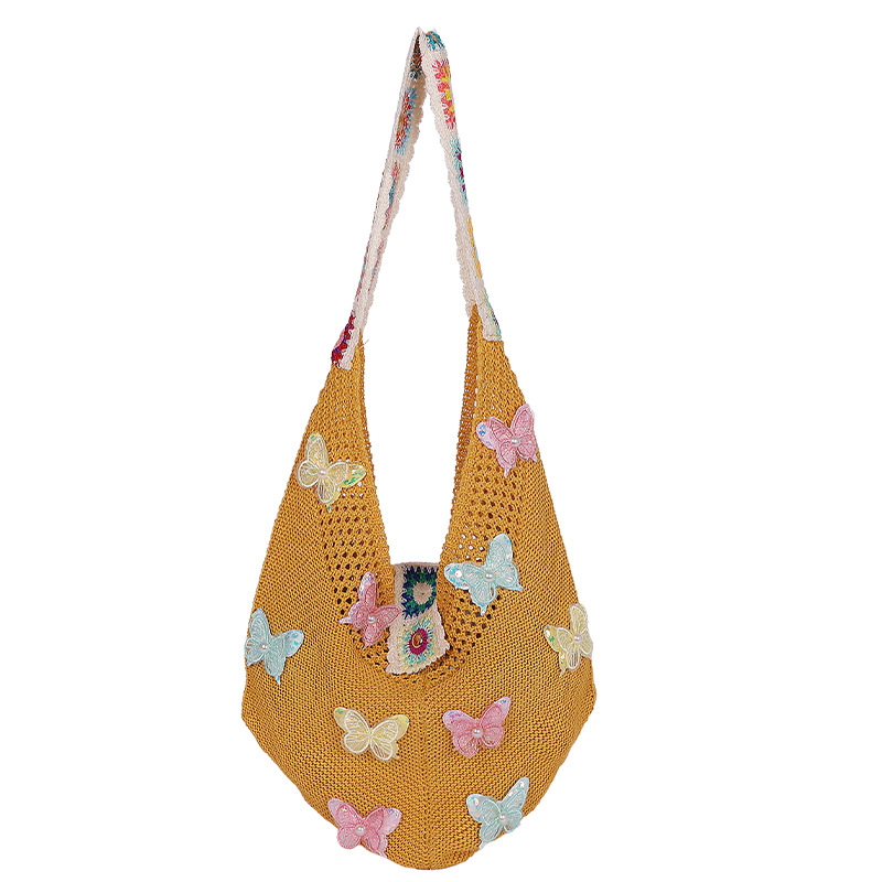 Versión coreana del bolso de nicho 2025 verano nuevo bolso femenino mariposa bolso tejido bolso de hombro de punto de gran capacidad