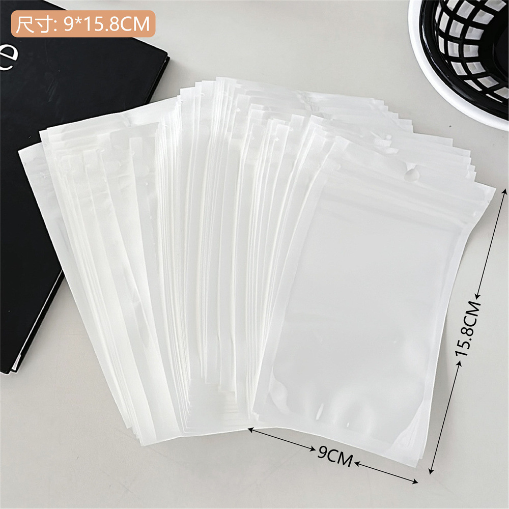 Colección de bolsas opp transparentes, cabeza de tarjeta, bolsa de embalaje trasera, bolsa de joyería pequeña, bolsa autoadhesiva con orificio colgante, bolsa de embalaje de plástico al por mayor