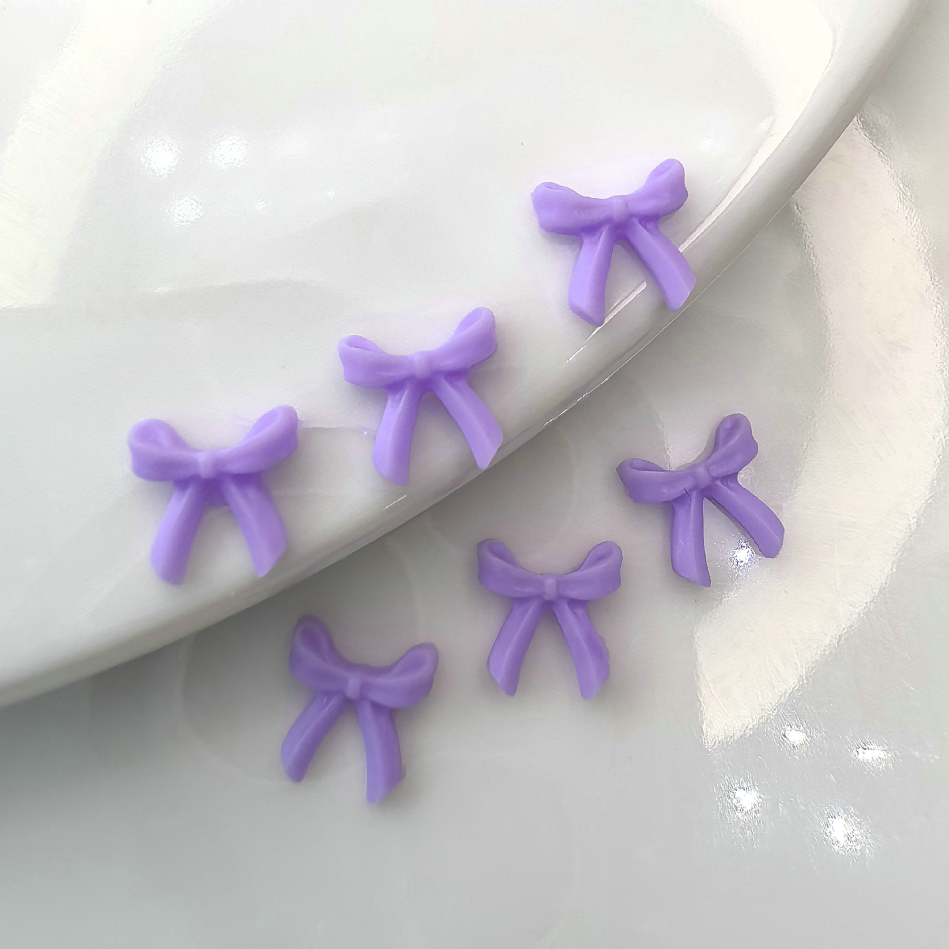 蝴蝶结美甲饰品批发儿童学生老人青年大学生工人教师0011.j