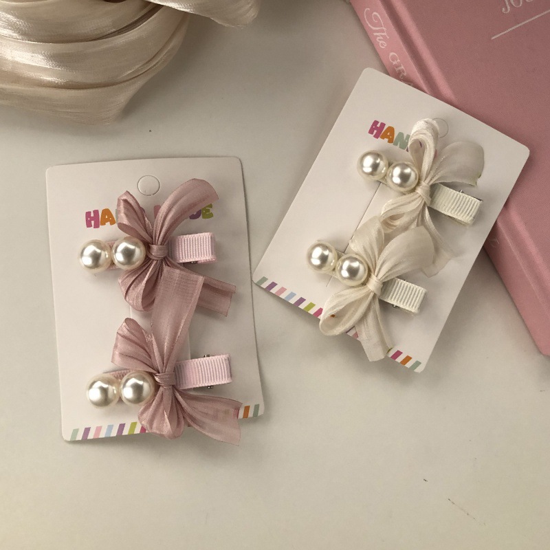 Fuchsia hairgrip with bow