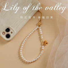 天然真珠携帯電話チェーン吊りチェーンスズラン手首ロープライト高級ハイエンド女性の携帯電話ストラップペンダントチェーン