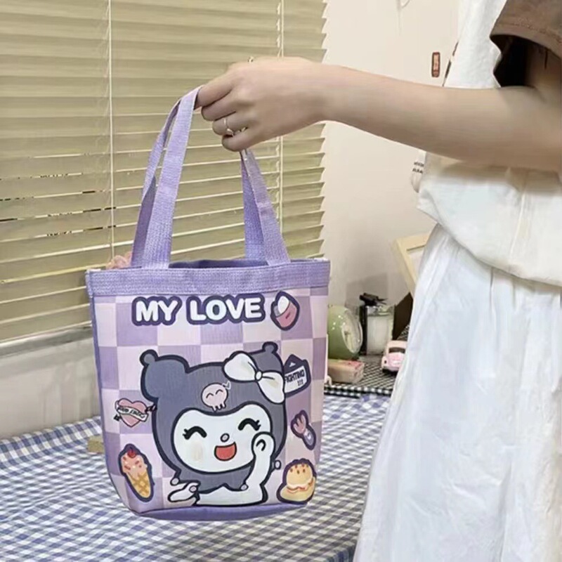 かわいい落書きバケツバッグinsプリント円筒バッグキャンバス弁当袋韓風少女は弁当箱を持っています。|undefined