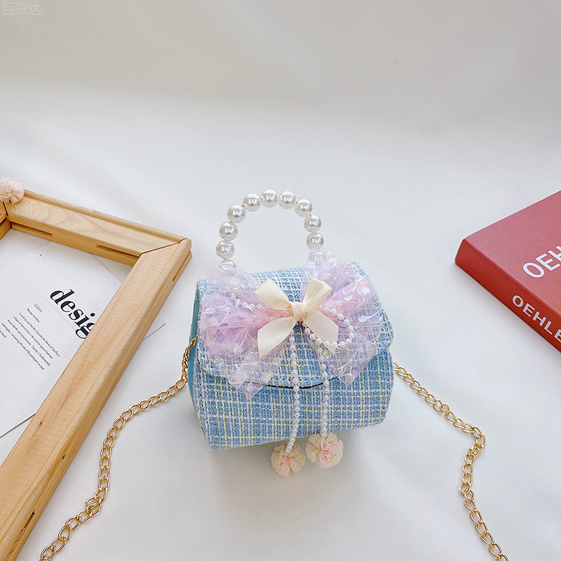 Bolsa de moda para niños 2021 otoño e invierno nuevo algodón y lino de lana estilo Chanel arco perla bolsa de mensajero portátil para niñas
