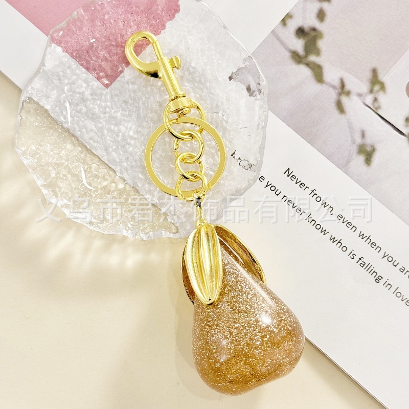 さくらんぼのキーホルダーアクセサリーのバッグのストラップがおしゃれで美しい水晶樹脂車センチ車のキーホルダーの女性