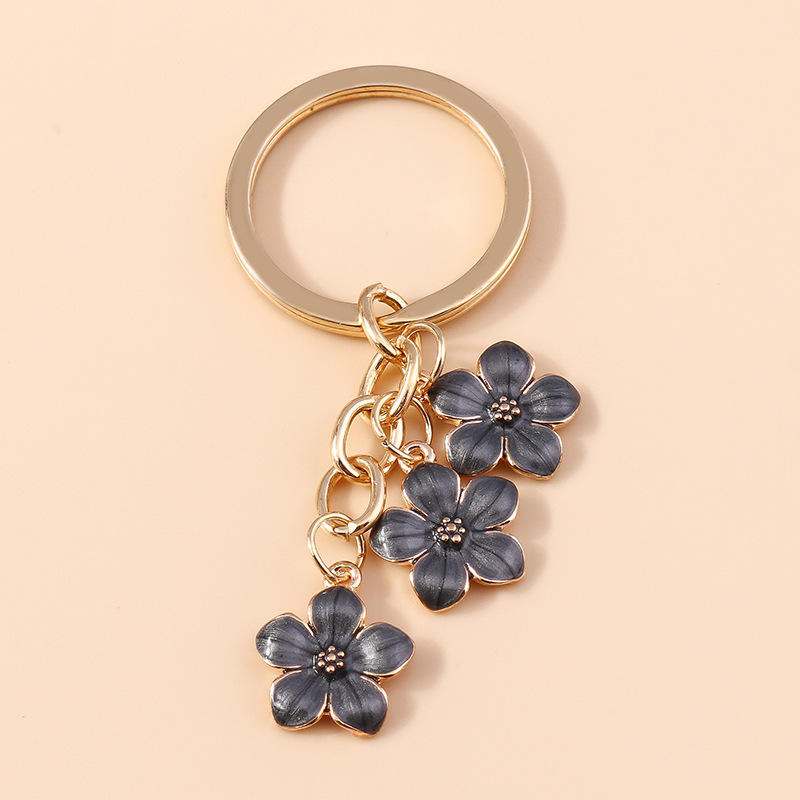 Dulce chica corazón flor de cerezo llavero simple Flor del ciruelo flor teléfono móvil bolso colgante decorativo joyería