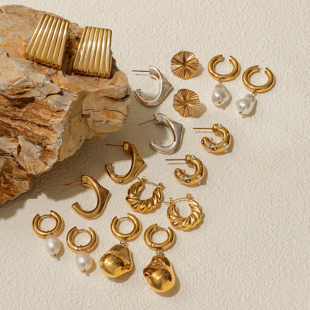 Jieding Pendientes de acero inoxidable europeos y americanos Pendientes de perlas de lujo ligero, sentido de diseño femenino, joyería de acero de titanio de nicho transfronterizo