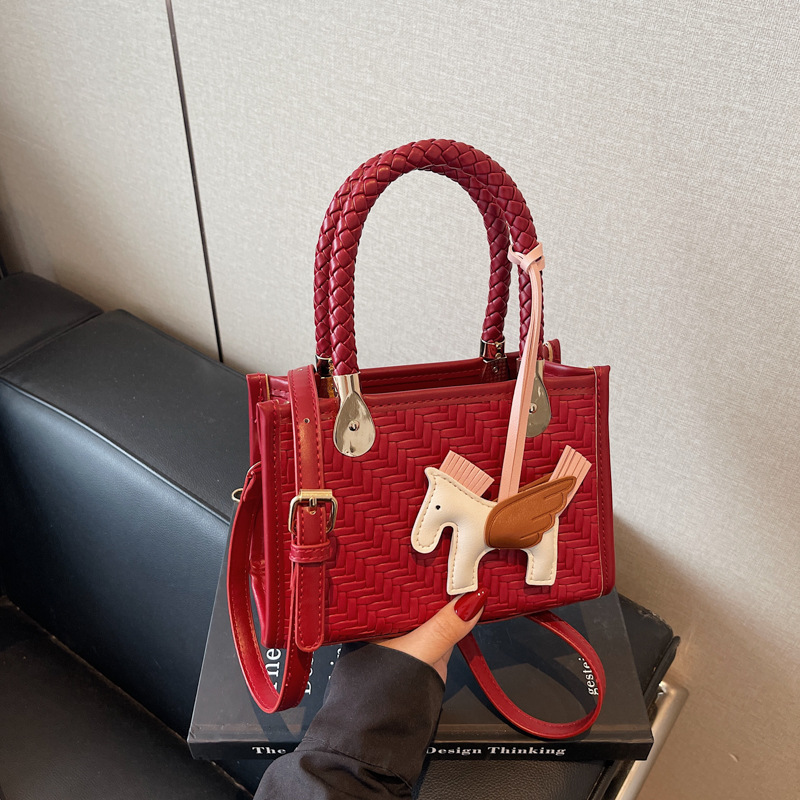 Bolso tejido más vendido de comercio exterior para mujer 2025 nuevo bolso de hombro de moda de color en contraste textura bolso cuadrado pequeño de mensajero de todo fósforo