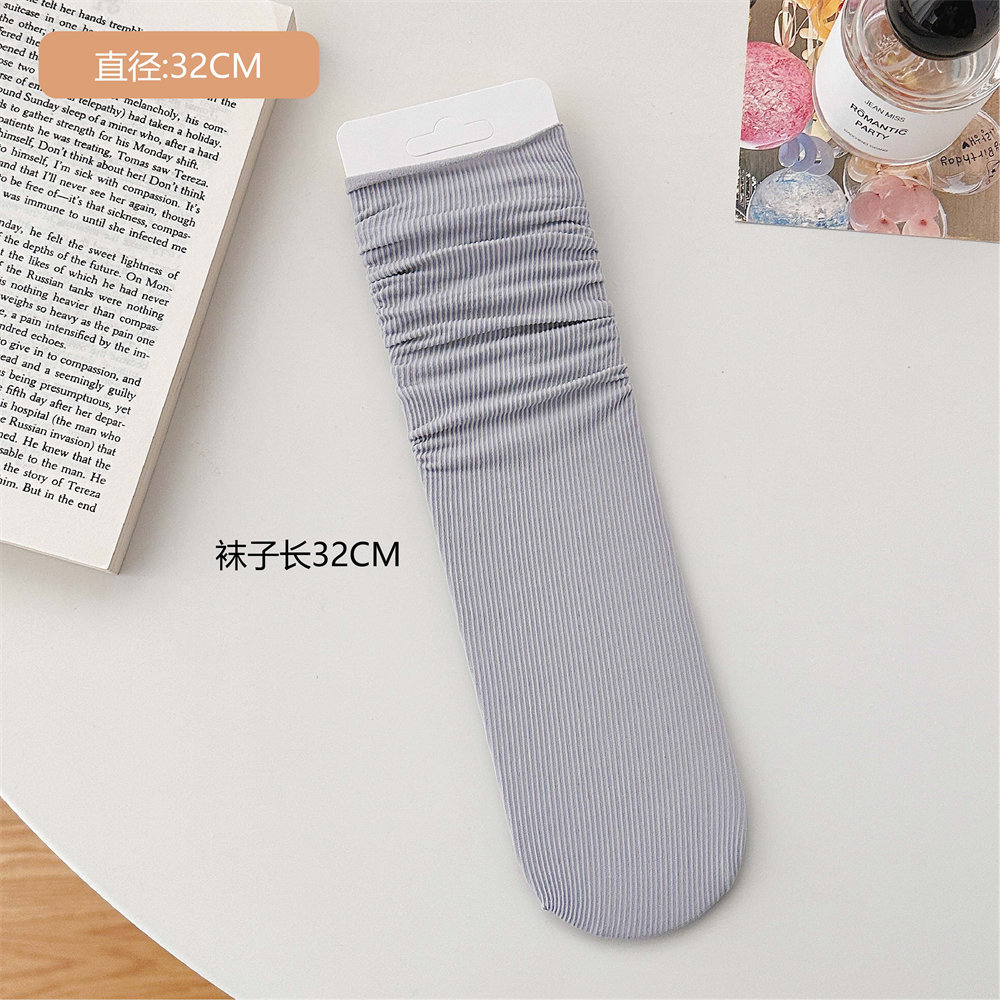 Calcetines de hielo calcetines de terciopelo de primavera y verano para mujer medias de media pantorrilla calcetines de JK largos blancos puros calcetines de moda al por mayor