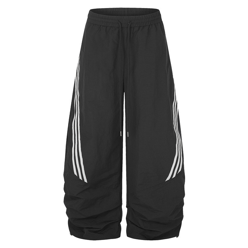 Black side-striped athletic pants, unisex, with elastic drawstring, deconstructed wide-leg design, and adjustable cuffs, perfect for street casual wear Black side-striped athletic pants, unisex, with elastic drawstring, deconstructed wide-leg design, and adjustable cuffs, perfect for street casual wear