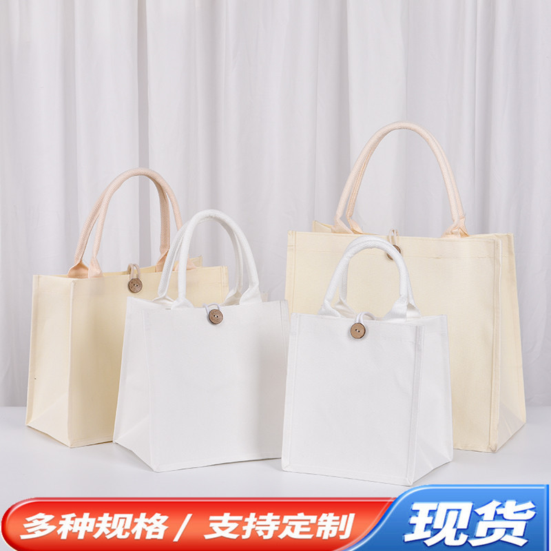 Bolsa de lona en stock, bolsa de lienzo para niños pintados y teñidos DIY, película en blanco cubierta, bolsa de lona tridimensional