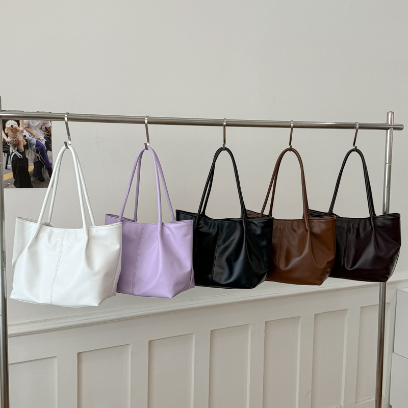 Bolso 2026 nuevo retro bolso de hombro de transporte de gran capacidad bolso de mujer simple y versátil bolso de brazo portátil