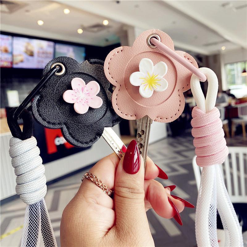 Cubierta de la llave nuevo corazón de niña explosiva Llavero Coche eléctrico PU Cubierta de la tarjeta de control de acceso para el hogar Sensor de gota de agua Amazon