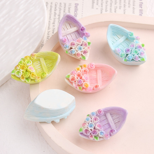 Cartoon DIY resin accessories and decorations: flowers, small boats, cream glue, handmade hair clips, phone cases, shoe clips, and other accessories.