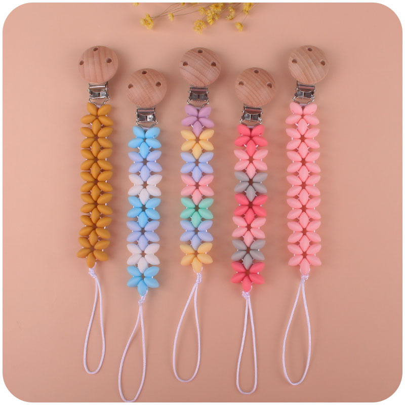 Nuevos suministros para bebés pétalo Cadena de chupete calmante bebé Arco Iris cuentas de silicona clip de chupete de haya Amazon