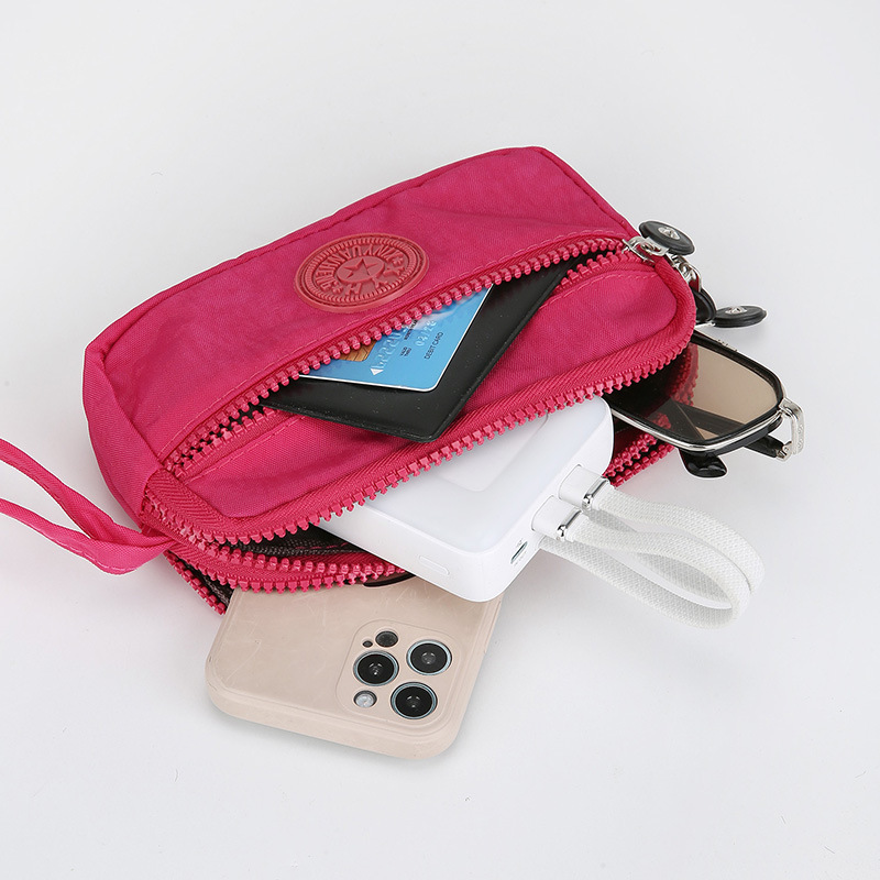 2025 nuevo bolso de mujer multifuncional bolso de cambio portátil bolso de mano de moda de mediana edad simple bolso multicapa bolso móvil