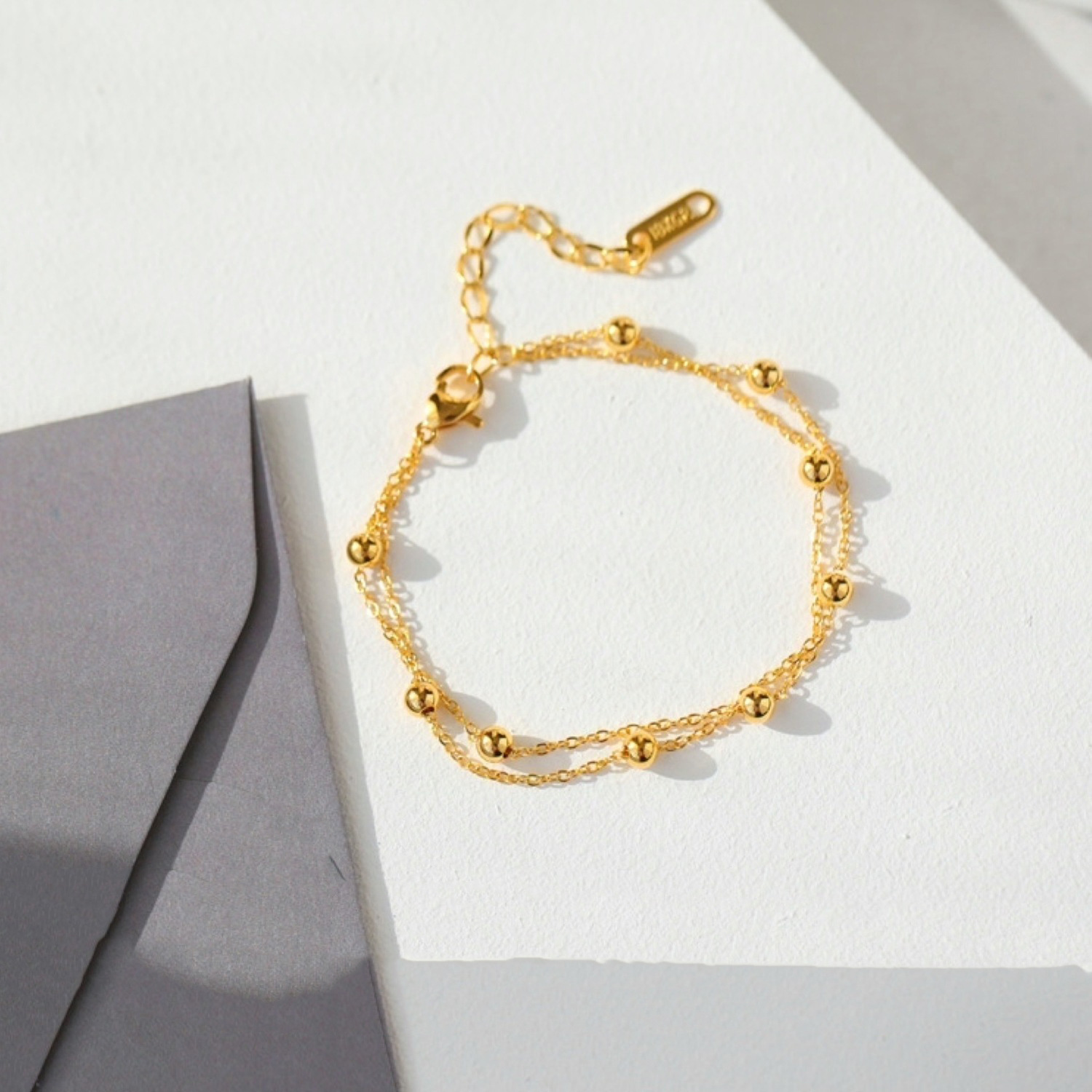 Pulsera de cuentas simple de doble capa que no se desvanece, oro nuevo diseño de nicho ins, niña, novia, joyería de mano femenina