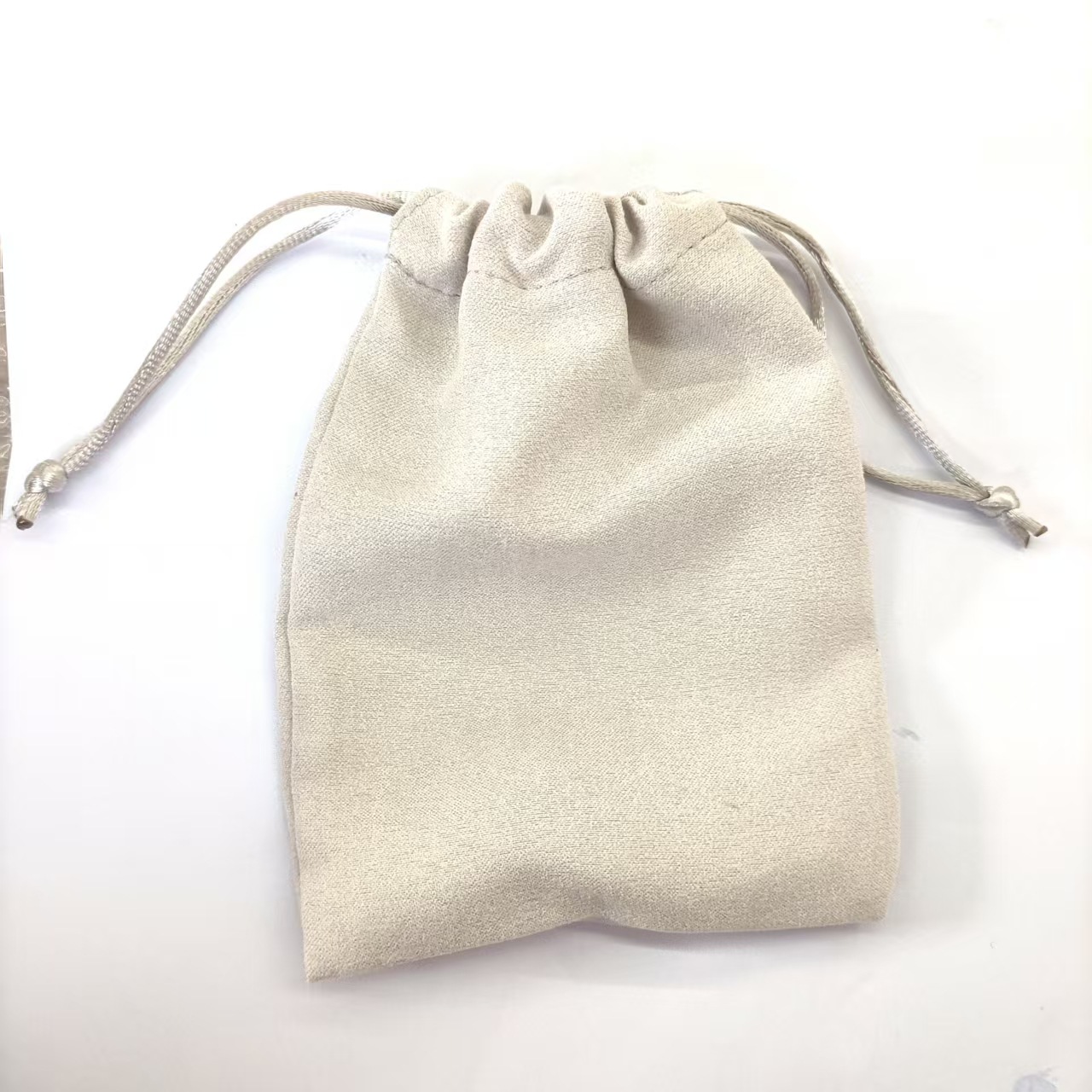 Cotton and linen drawstring jewelry pouches with gold foil logo, Jianzhan storage bags, drawstring packaging bags for collectibles, wholesale