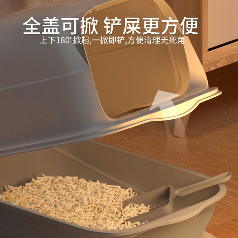 La caja de arena para gatos es de gran tamaño, a prueba de salpicaduras externas, completamente cerrada, inodoro para gatos con manijas
