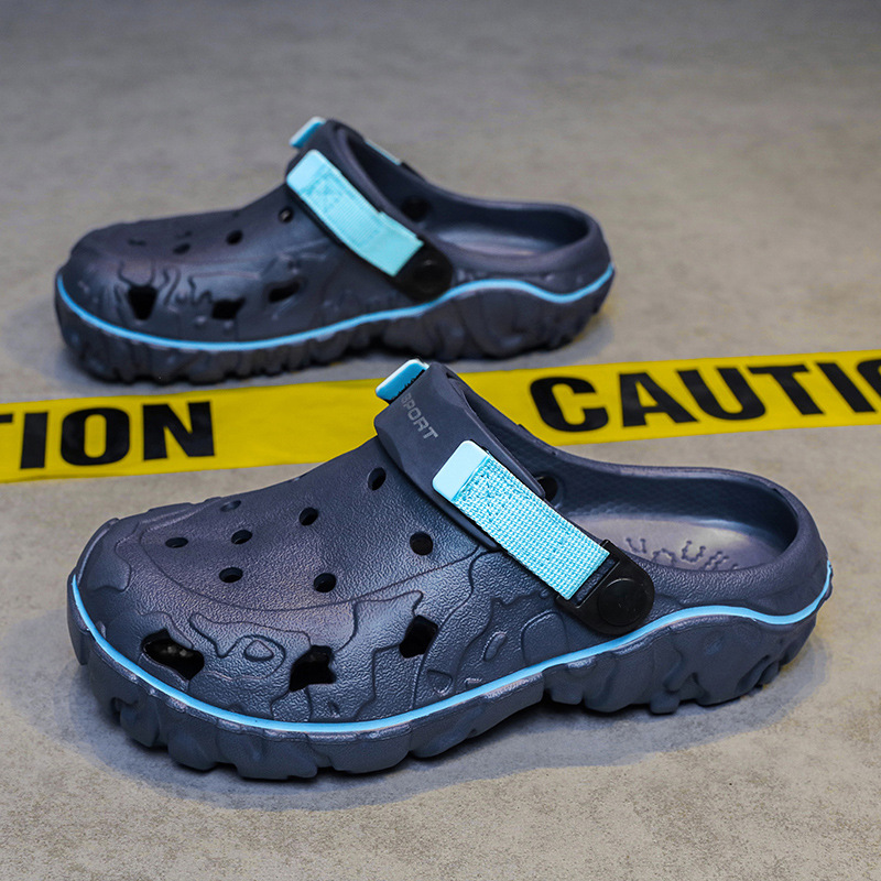 Verano nuevo estilo coreano de moda zapatos sandalias de jardín zapatos transfronterizos de tamaño grande versátil casuales dos zapatillas de moda para hombres