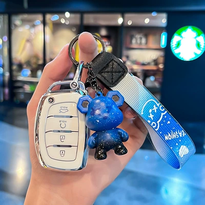 Car key bag for foreign trade South Korea modern - modern-r-model-smart-4-button-start-single-shell-white-blue-violent-bear-pendant