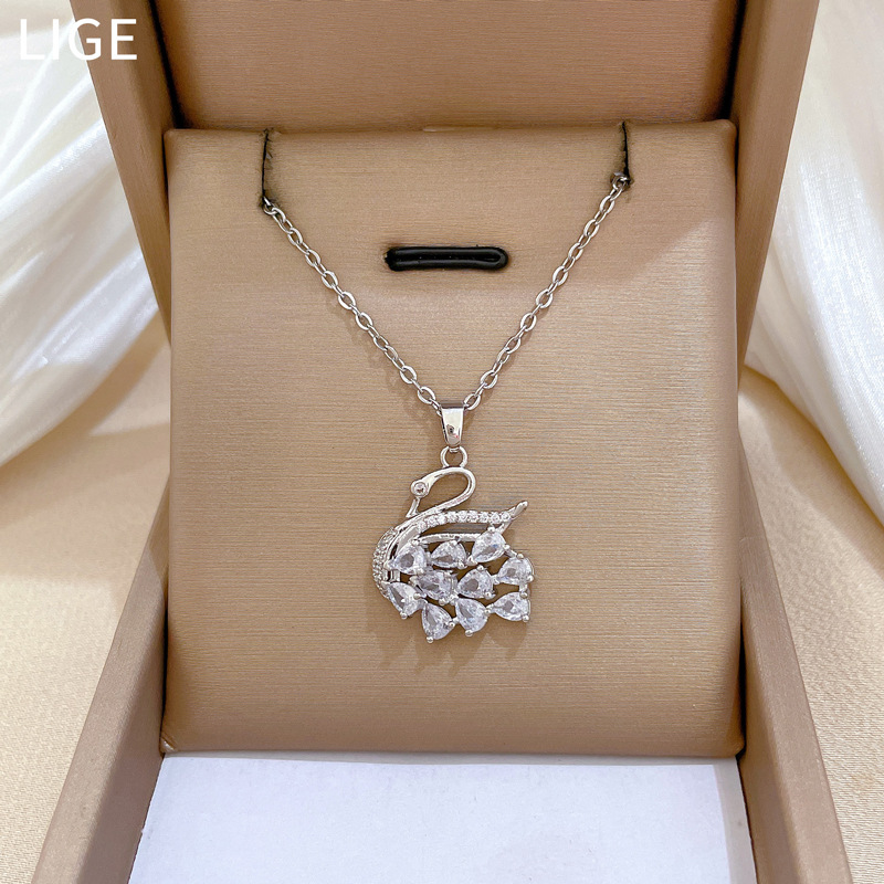 Collana con cigno e cristalli in acciaio titanio per donna_voghion.com