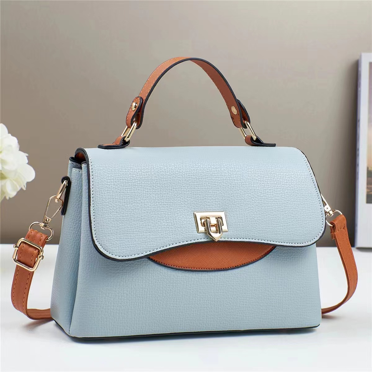 Fabricantes coreanos nuevos bolsos de comercio exterior mujeres texturas de hombro, bolsos inclinados para mujeres 2025 bolsos de mano de moda