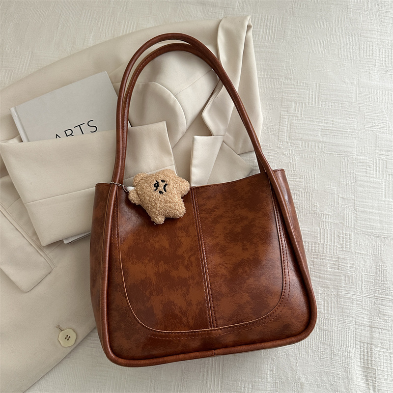 Bolsos populares para mujer 2024 otoño e invierno nuevo estilo coreano retro de gran capacidad para viajar en clase bolso de hombro bolso de moda