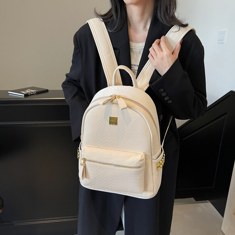 Mochila de moda coreana popular de mujer simple de color sólido mochila universitaria 2025 nueva moda de bolsas de mujer de gran capacidad