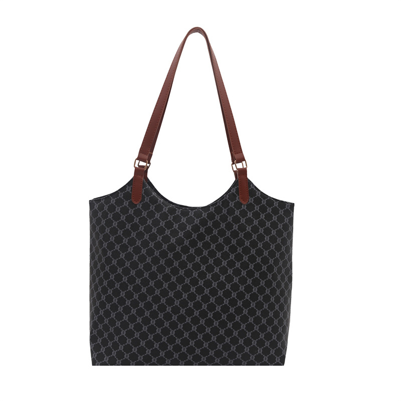 Bolso de gran capacidad de Europa y los Estados Unidos, bolso de personalidad de viaje femenino, bolso de 2025 nuevo estilo de bolso de hombro de tendencia estética, bolso de textura femenina