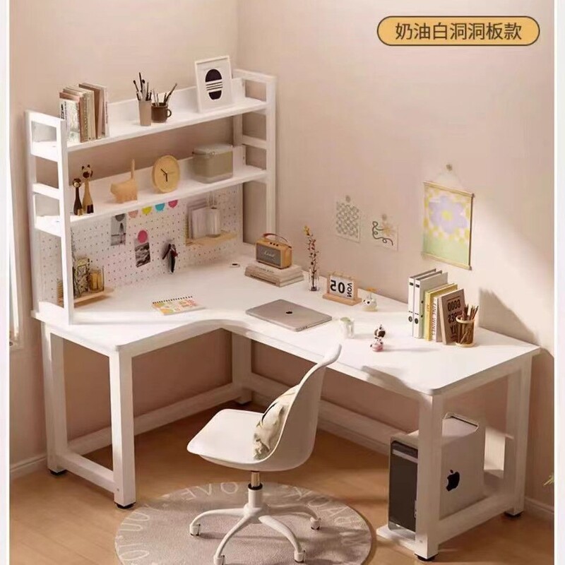 Corner computer desk for home use in the bedroom, L-shaped cream-style perforated board corner desk with integrated bookshelf Corner computer desk for home use in the bedroom, L-shaped cream-style perforated board corner desk with integrated bookshelf