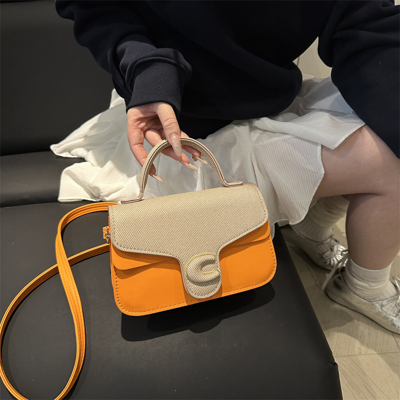 Trendy de verano 2025 nuevo bolso cuadrado pequeño de color en contraste bolso de moda bolso diagonal portátil de textura occidental de todo fósforo para mujer