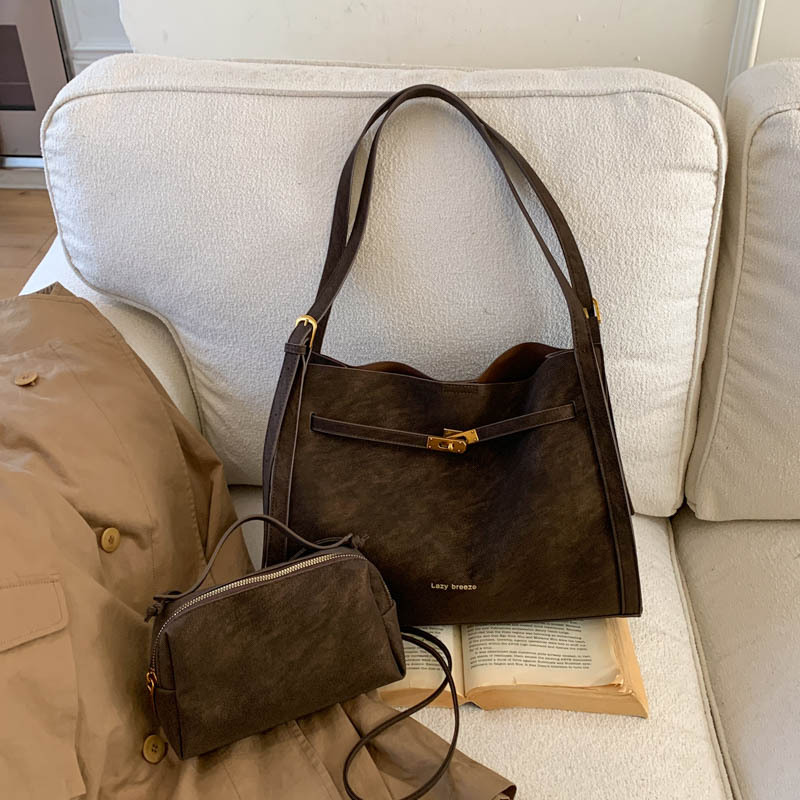Temperamento de moda de color sólido ocio retro ventas calientes nuevas bolsas de mano de mujer de gran capacidad de viaje de hombro bolsas de tendencia
